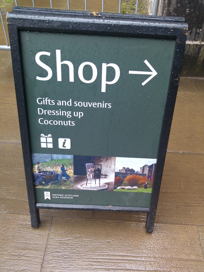 photo of sign for shop showing availability of coconut shells

